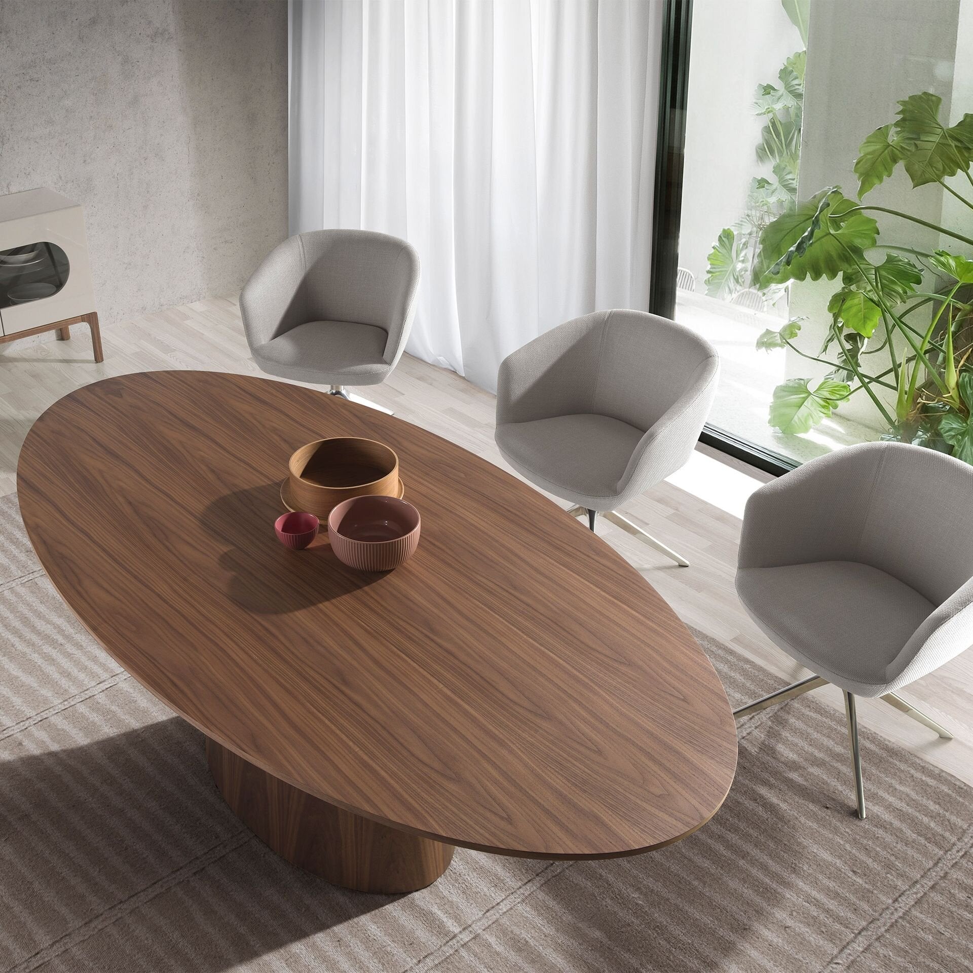 Oval walnut dining table